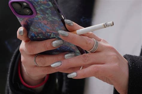 UK government mulling crackdown on outdoor smoking. Pubs are .